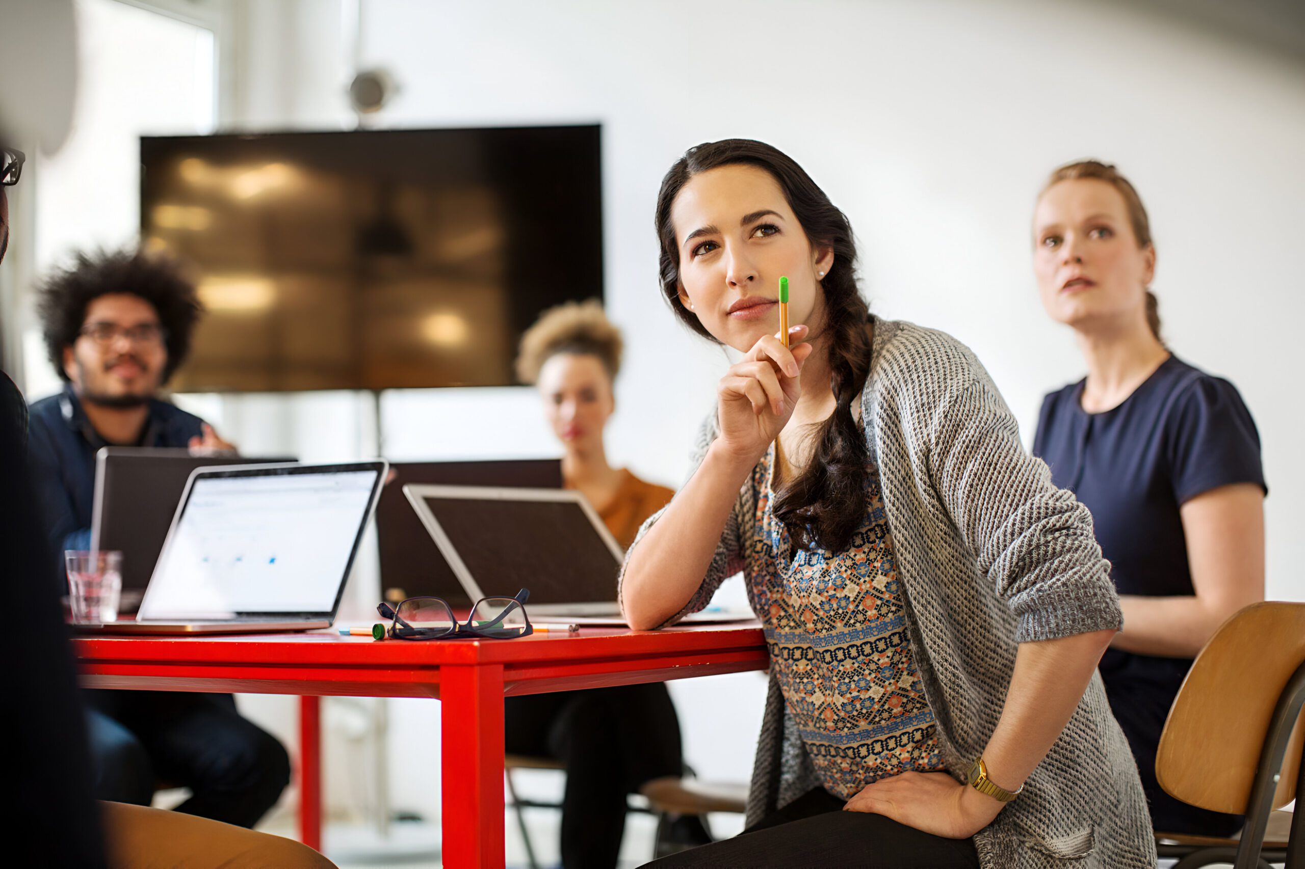 woman-with-coworkers-conference-room_774935-2407-scaled.jpg